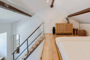 Ένα ή περισσότερα κρεβάτια σε δωμάτιο στο Portela House