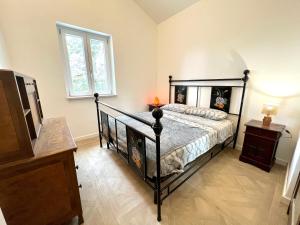 Una cama o camas en una habitación de Villa Max