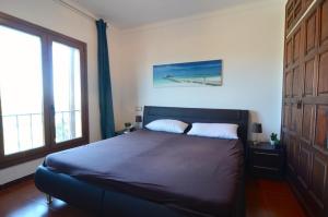 Posteľ alebo postele v izbe v ubytovaní VILLA GARBINELL + 34 fotografií