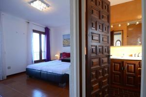 Posteľ alebo postele v izbe v ubytovaní VILLA GARBINELL