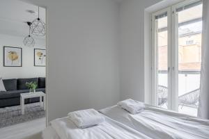 Postel nebo postele na pokoji v ubytování 2ndhomes Tampere "Pikku Aleksi" - Apartment with Best Location & Balcony