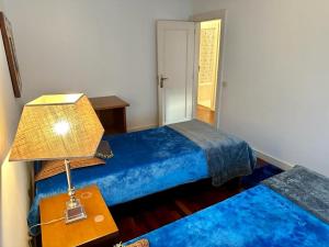Cama o camas de una habitación en Apartamento Laranjeiras