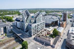 an aerial view of a city with tall buildings at Stunning Views 11th Floor 2BR Home with Sauna - Hosted by 2ndhomes in Tampere