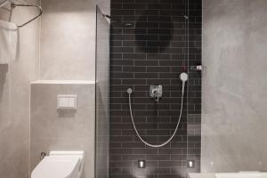 Vannituba majutusasutuses Derand Hotel