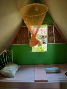 Postel nebo postele na pokoji v ubytování Lagkaw Uno in Lagkaw Homestay