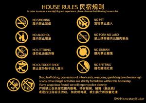 a set of prohibition signs in chinese and japanese at S99 HOMESTAY KUDAT in Kudat