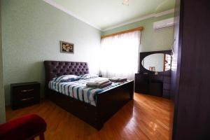 Postel nebo postele na pokoji v ubytování Sofia's guest house