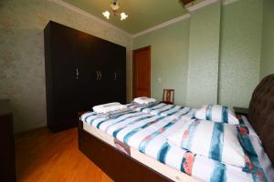 Postel nebo postele na pokoji v ubytování Sofia's guest house