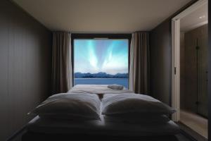 Voodi või voodid majutusasutuse Aera - Glass cabins toas