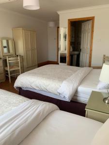 Postel nebo postele na pokoji v ubytování Quay House