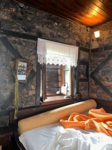 Krevet ili kreveti u jedinici u okviru objekta Apalni Traditional Guesthouse