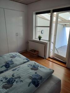 Bjergby Sønderbo feriehus客房内的一张或多张床位