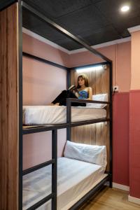 SOM Hostel By The Venue客房内的一张或多张床位