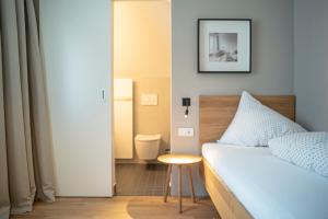 Letto o letti in una camera di Gasthof Löwen Tosters