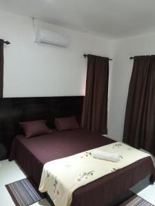 1 Schlafzimmer mit 2 Betten in einem Zimmer in der Unterkunft Samayra's Apartment in Nadi