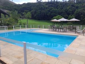 Bazén v ubytování Casa de Campo Teresópolis nebo v jeho okolí