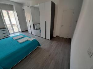 Postel nebo postele na pokoji v ubytování Fuori Ortigia room 1
