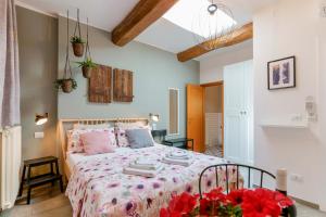 Ένα ή περισσότερα κρεβάτια σε δωμάτιο στο B&B Il Viaggio Bologna