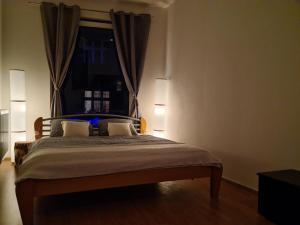 Postel nebo postele na pokoji v ubytování City Centre Apartments
