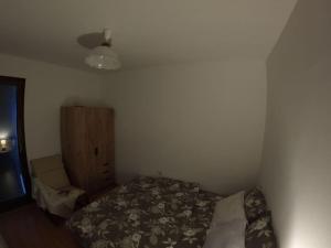 Una cama o camas en una habitación de Povetarac