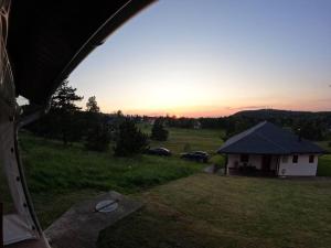 Amanecer o atardecer desde la casa vacacional o alrededores