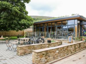 a building with bikes parked outside of it at Pheasant Cottage in Richmond
