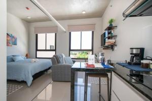 O bucătărie sau chicinetă la Delicado Monoambiente-comfy Studio