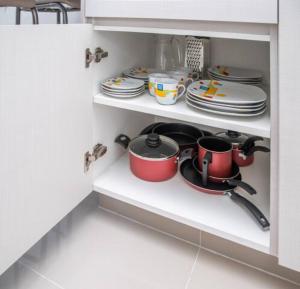 Majoituspaikan Delicado Monoambiente-comfy Studio keittiö tai keittotila