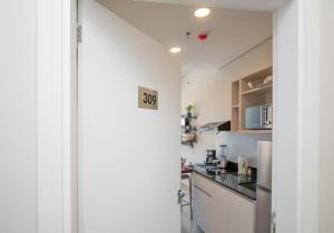 Majoituspaikan Delicado Monoambiente-comfy Studio keittiö tai keittotila