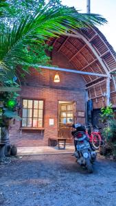 Fotografie z fotogalerie ubytování Coconut Tree Cottages v destinaci Batukaras