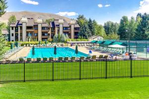 a swimming pool in front of a resort at Creekside 1274 in Sun Valley