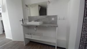 a bathroom with a sink and a mirror at La colombe in Argelès-sur-Mer +11 photos