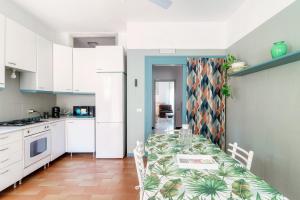 O bucătărie sau chicinetă la Casa Vincentina con Parcheggio Privato 6 Posti Letto