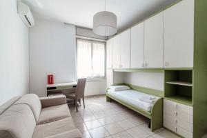 Un pat sau paturi într-o cameră la Casa Vincentina con Parcheggio Privato 6 Posti Letto