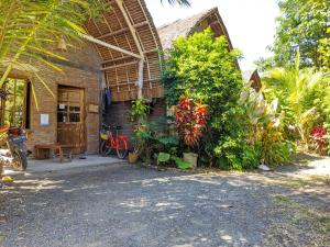 Zahrada ubytování Coconut Tree Cottages