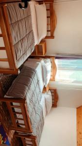 Cama o camas de una habitación en Bujtina Kometa