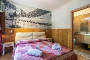 Postel nebo postele na pokoji v ubytování Residence Covalou