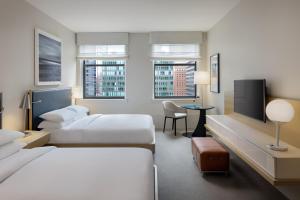 Postel nebo postele na pokoji v ubytování Hyatt Centric The Loop Chicago + 37 fotografií
