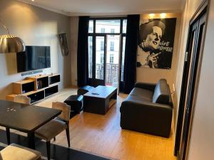 אזור ישיבה ב-Fabulous apartment in heart of Paris