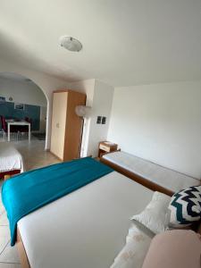 Postel nebo postele na pokoji v ubytování Apartments Edina