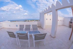 Balkón nebo terasa v ubytování Le Sifah - Marina View Apartments & Villa
