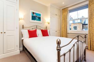 Кровать или кровати в номере Veeve - Comfort in Kensington