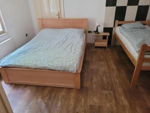 Postel nebo postele na pokoji v ubytování Cozy place 1