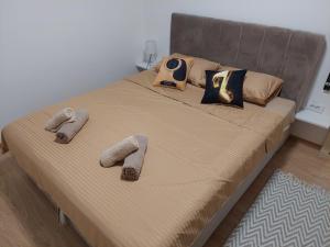 Postel nebo postele na pokoji v ubytování Apartman Muzika Jagodina