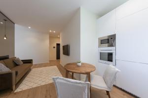 Kuchyň nebo kuchyňský kout v ubytování ММ GROUP APARTMENT + 37 fotografií