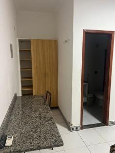 Rúm í herbergi á Versatile Park Hotel