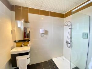 Koupelna v ubytování Fini Hotel Bobende