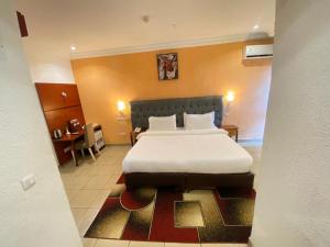 Postel nebo postele na pokoji v ubytování Fini Hotel Bobende
