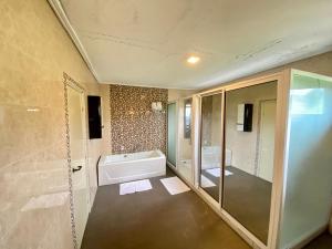 Koupelna v ubytování Fini Hotel Bobende