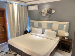 Postel nebo postele na pokoji v ubytování Fini Hotel Bobende